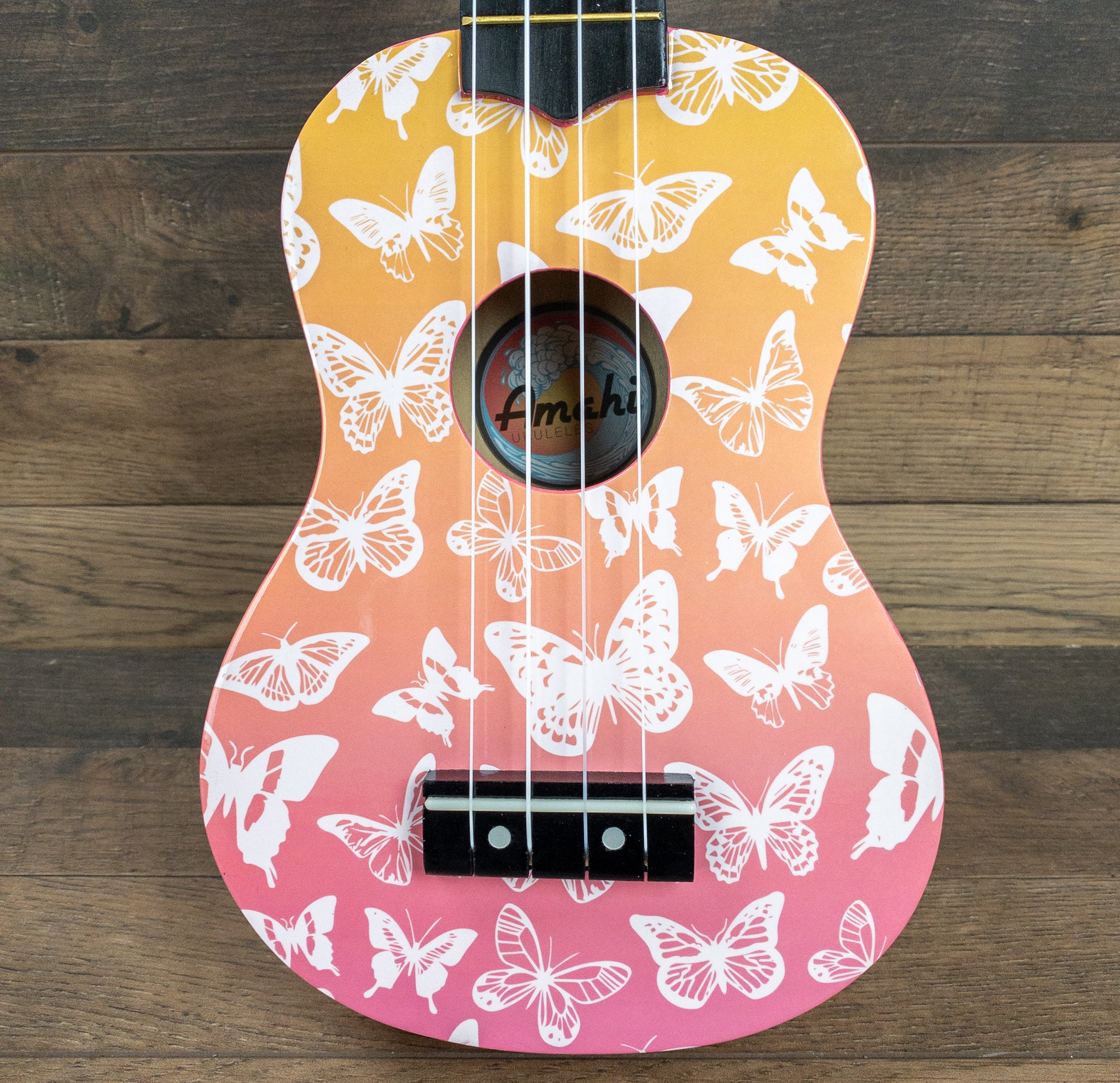 Amahi DDUK14 Ukulele Soprano Sunset Mariposa Butterfly Design w/ Vinyl Carry Bag